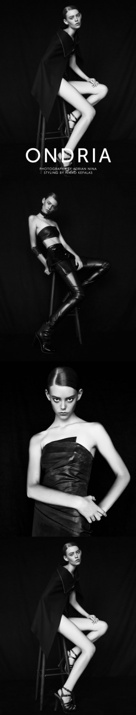 伊琳娜-美国模特大美女穿着现代时尚的黑白色切割边缘皮革外套时装设计