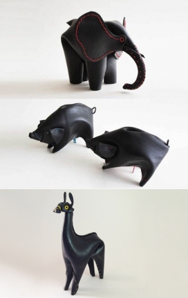 完美的游戏-回收橡胶做的动物玩具，每个动物都是纯黑色和多彩线程
