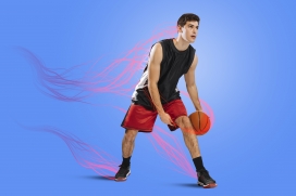 动感红色丝绸线条运动的篮球