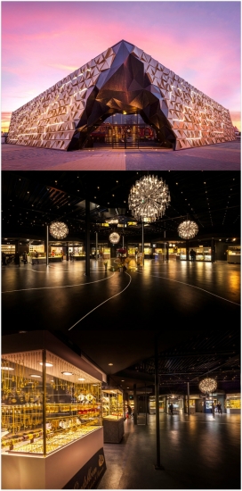 荷兰黄金交易市场-在著名的大巴扎东部市场，有一个全新的大厅，大量的不均匀形状金片，被放置在不同的方向，以使整个建筑物白天和夜间在不同的照明条件下闪闪发光。
