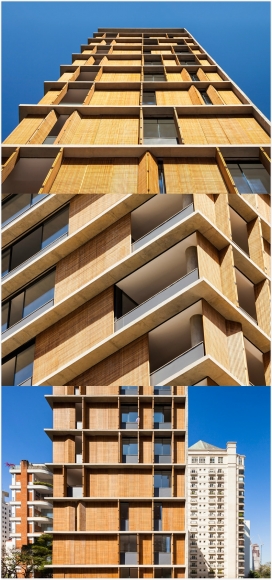 穿孔屏木制百叶窗公寓楼-居民可以通过百叶窗来控制自己的日光生活空间，顶部具有较大的复式占据结构。