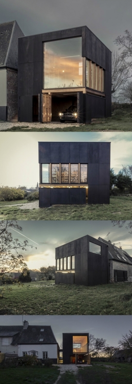 熏黑木材小屋-位于法国南部，采用熏黑的胶合板箱为主材料，为居民提供了一个60平方米私人图书馆和车库