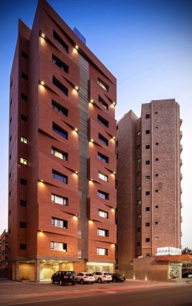 立面不规则形式的堆叠公寓楼-位于科威特城小区中央，共10层楼20套住房。以满足不断增长的外籍人士和不同寻常的需求。