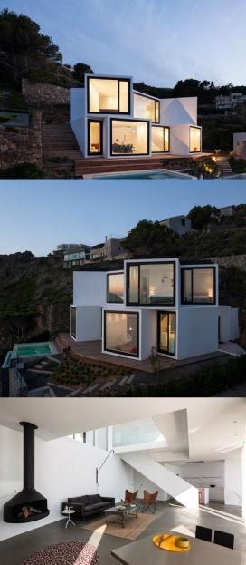 十个立方体的向日葵房子-坐落在西班牙可以俯瞰地中海的悬崖边，令人印象深刻的风光优势，光热进了屋像一个巨大的向日葵投影，是个度假的好去处