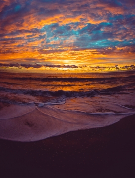 美丽的日落晚霞海潮